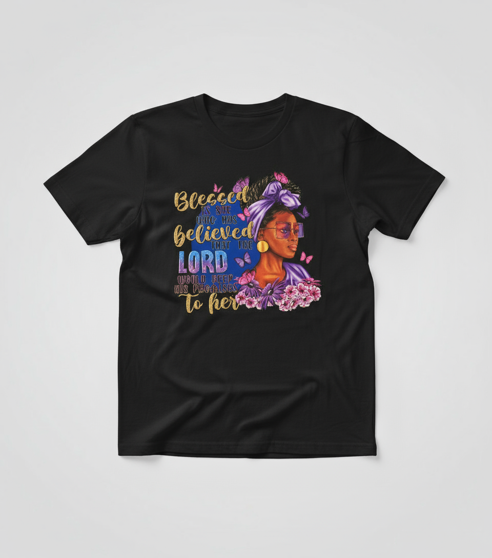 Black t-shirt with colorful graphic and text on a light gray background
