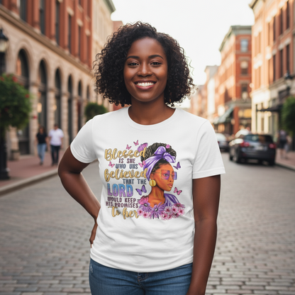 White t-shirt with a colorful graphic of a woman and text on a gray background